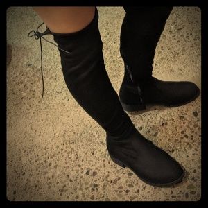 Black knee-high boots... Flat